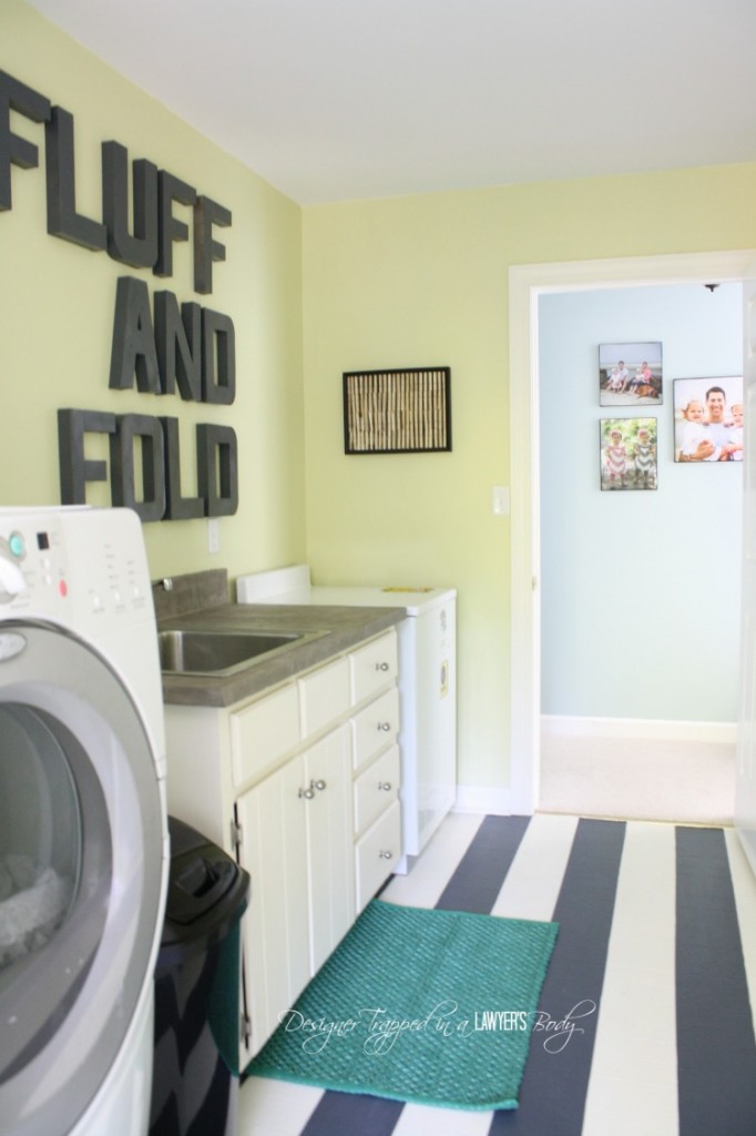 MUST PIN! Amazing DIY laundry room renovation for less than one hundred dollars! #diylaundryroom #laundryroommakeover