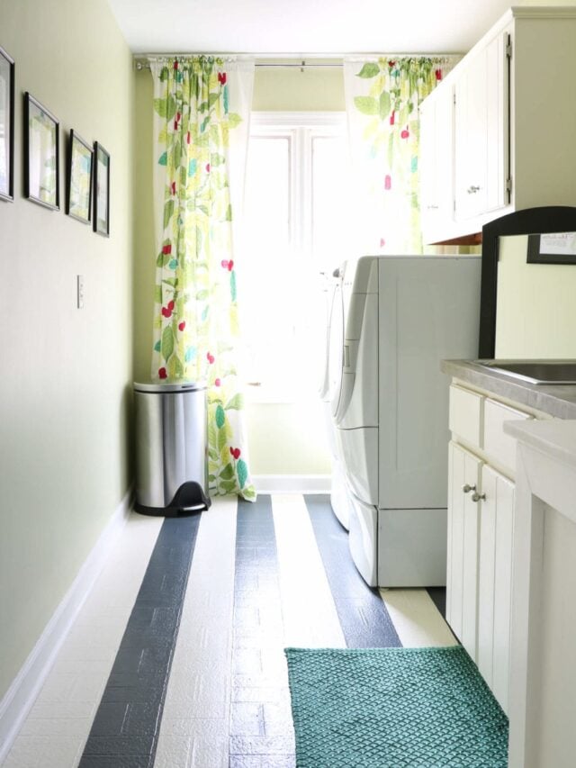 Image of colorful laundry room with painted vinyl floors in a stripe pattern