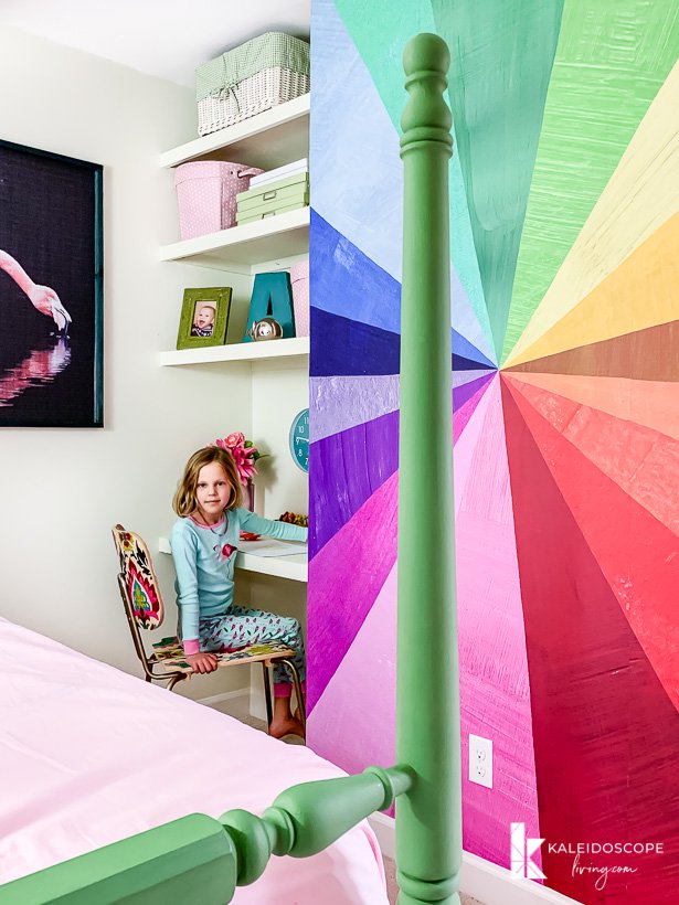 floating shelves and colorful mural