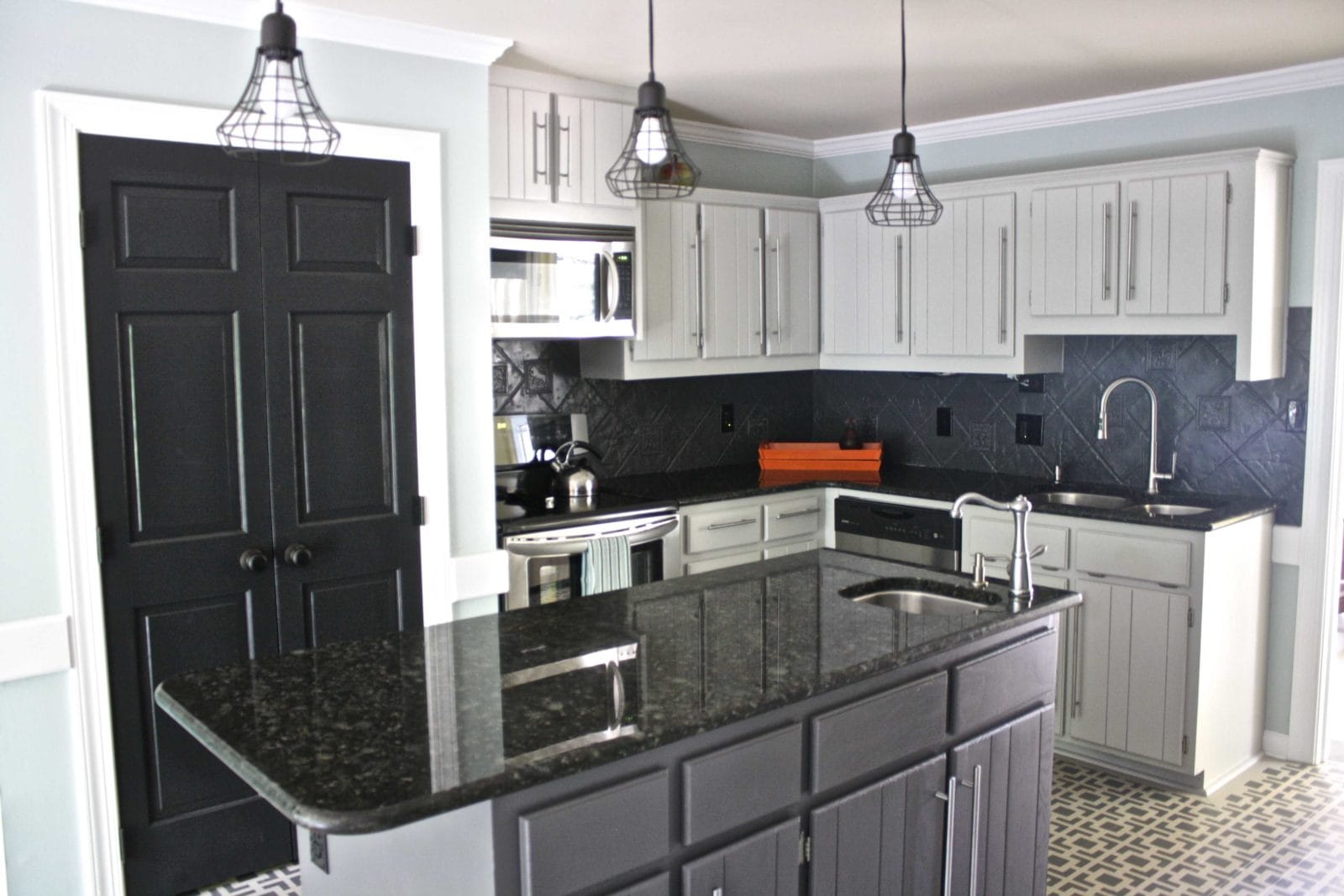 WOW! Budget kitchen remodel by Designer Trapped in a Lawyer's Body. Totally transformed with PAINT! #kitchenremodel