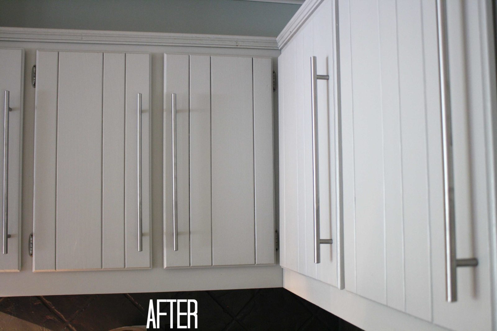 after picture of painted gray cabinets