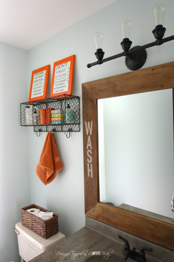 MUST PIN! Transform a builder grade mirror with wood and concrete! Full tutorial by Designer Trapped in a Lawyer's Body.