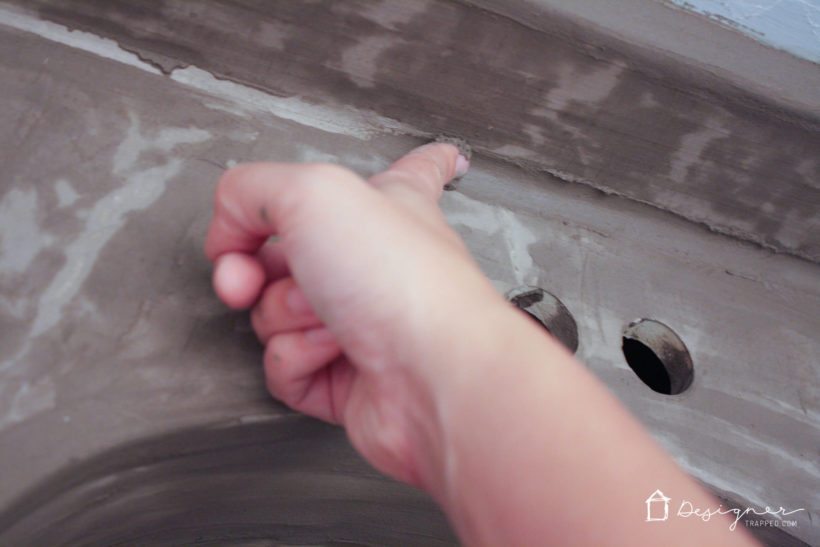 applying concrete to bathroom vanity