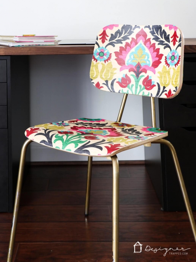 wood chair with fabric decoupaged on it