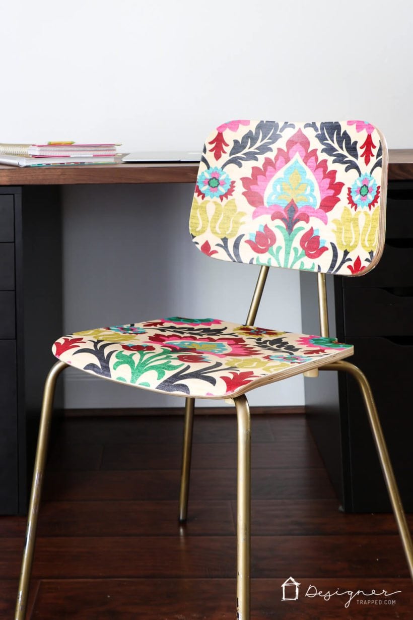 Did you know you can decoupage furniture to get an "upholstered" look on a tiny budget? Come check out how to "upholster" a chair with Mod Podge and fabric!