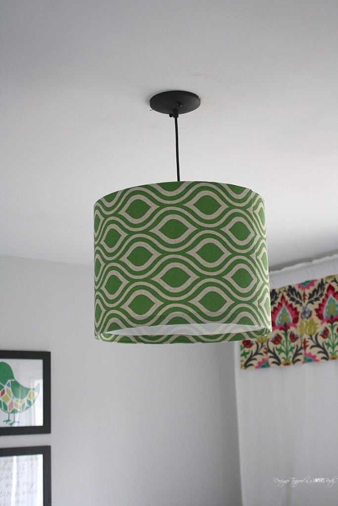 WOW! This is amazing! Learn to make your own DIY pendant light using your own fabric! Full tutorial by Designer Trapped in a Lawyer's Body.