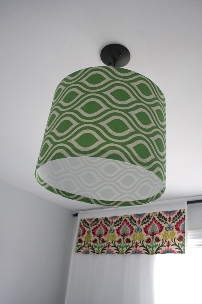 WOW! This is amazing! Learn to make your own DIY pendant light using your own fabric! Full tutorial by Designer Trapped in a Lawyer's Body.