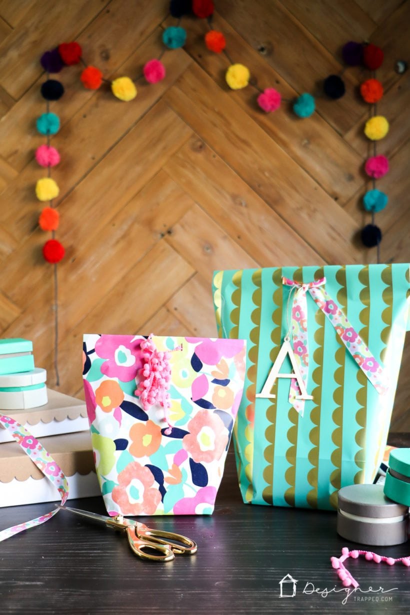 DIY wrapping paper gift bag and scissors, ribbons and boxes