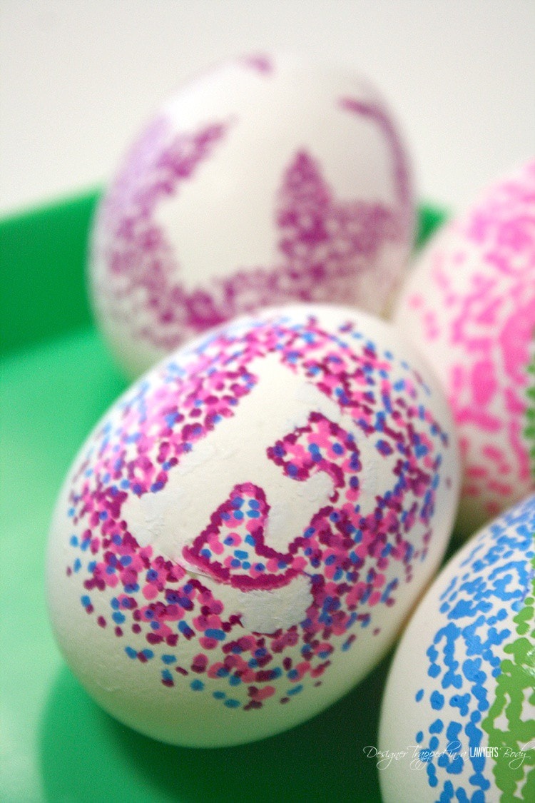 THESE ARE AMAZING! What a new,exciting way to decorate Easter eggs! Check out these easy dotted Sharpie Easter eggs tutorial by Designer Trapped in a Lawyer's Body.