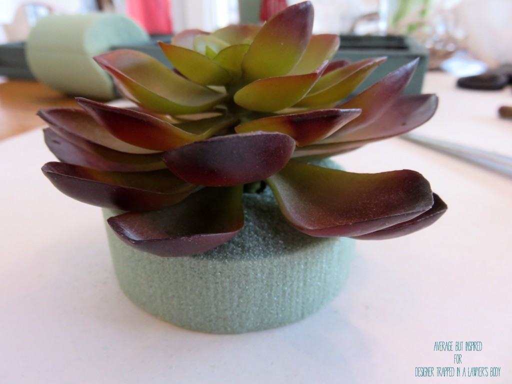 Awesome! Turn empty wooden toy containers into a no-maintenance vertical succulent garden with faux succulents