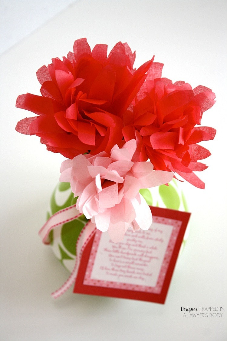 SO SWEET! These handprint flowers made from tissue paper are PERFECT for Mother's Day. You use your child's handprint as the template. Perfect for the moms or grandmothers in your life! Full tutorial from Designer Trapped in a Lawyer's Body.