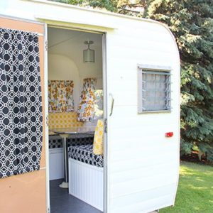 Check out this top-to-bottom, fun makeover, of a vintage camper with a retro-styled look!