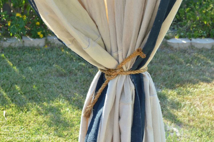 WOW! Make these gorgeous DIY, no-sew outdoor curtains without spending a ton of money!! Find the tutorial by Table & Hearth for Designer Trapped in a Lawyer's Body