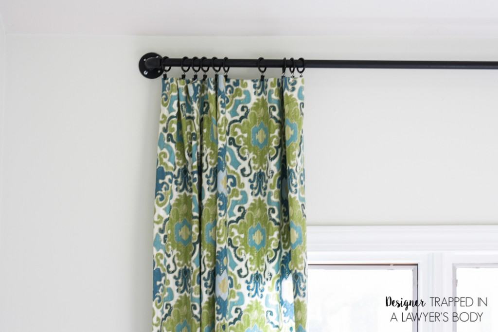 YES! This is an awesome post on how to make curtains the easy way! Full tutorial by Designer Trapped in a Lawyer's Body.