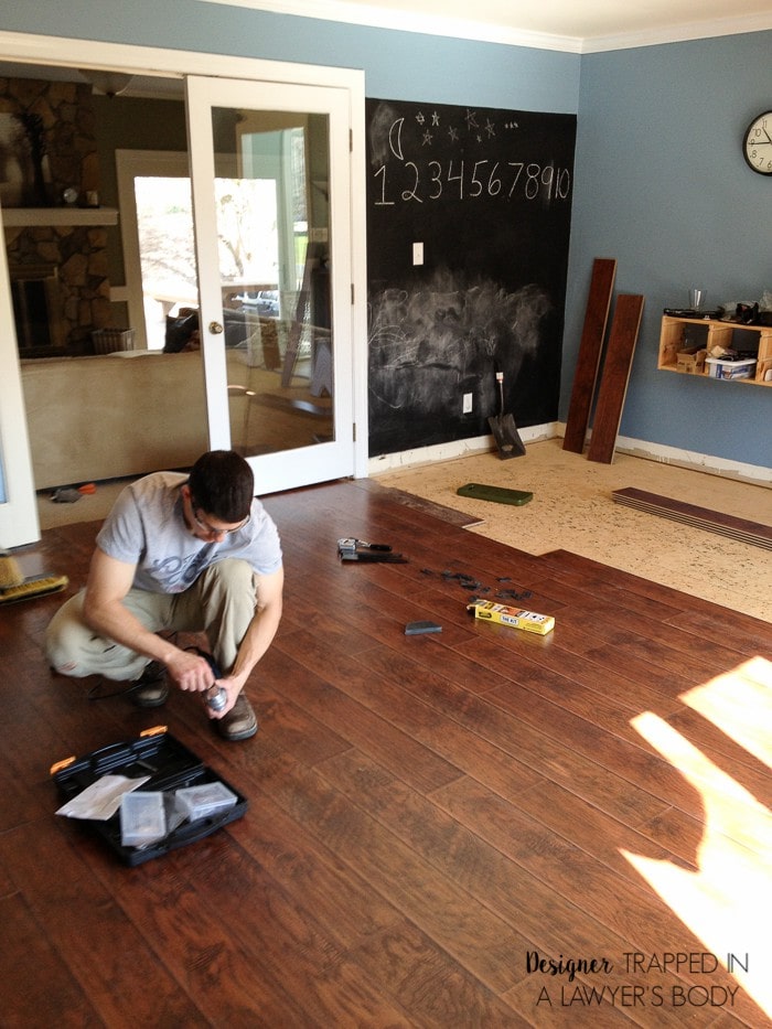 Laminate flooring has come a LONG way, y'all! Learn why I chose laminate flooring for our home! 