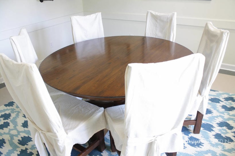 refinished dining table with white chairs