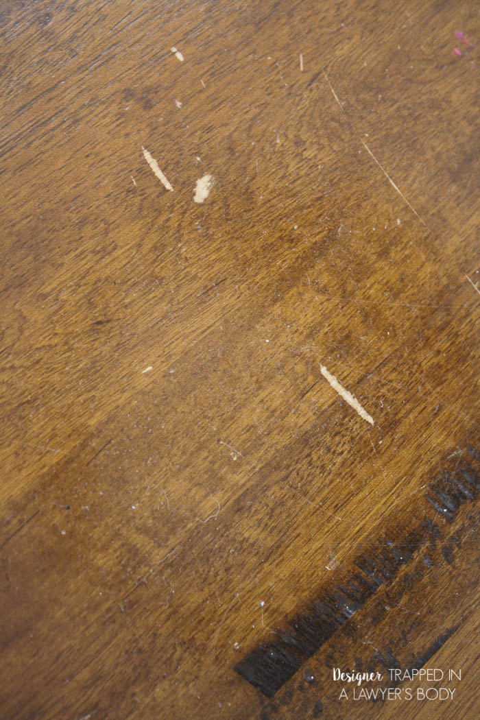 scratched wood tabletop
