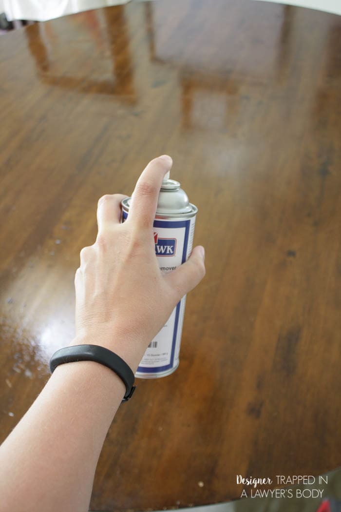 spraying wood table