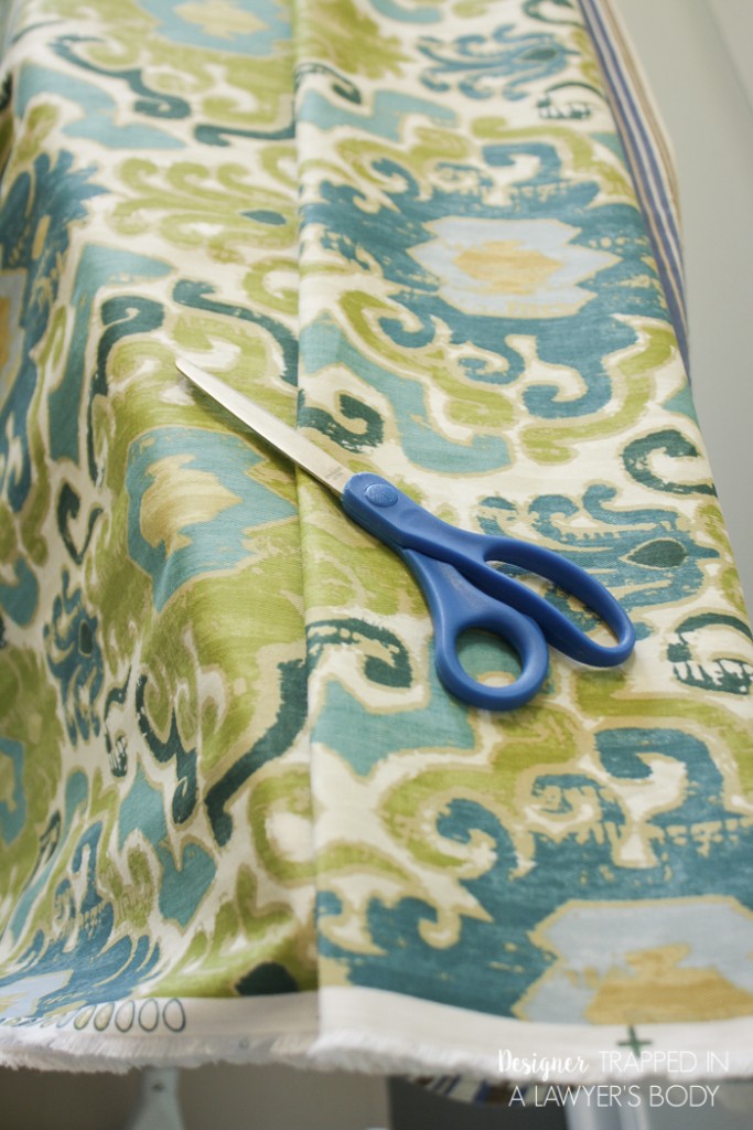 YES! This is an awesome post on how to make curtains the easy way! Full tutorial by Designer Trapped in a Lawyer's Body. 