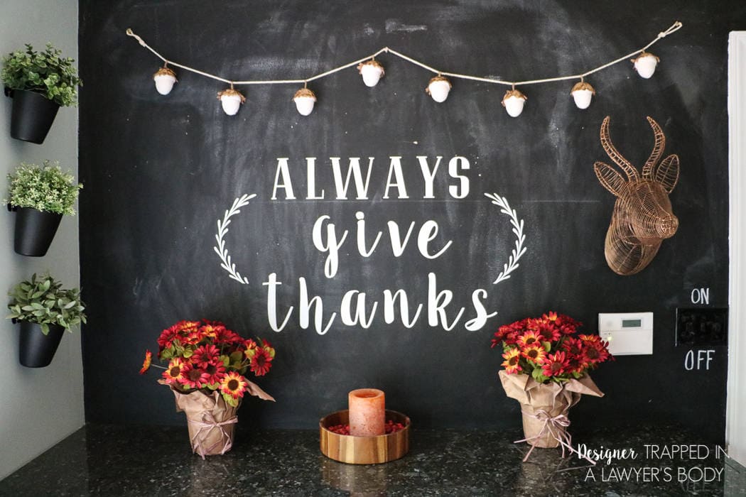 LOVE THIS fall chalkboard art and fall decor from Designer Trapped in a Lawyer's Body! Learn the easiest way to create a chalkboard wall with this tutorial.