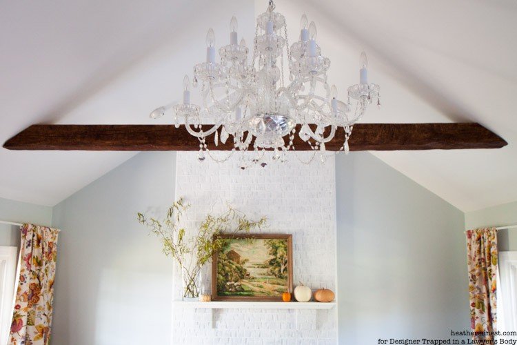 WOW! Come learn how to paint a brick fireplace with this full tutorial. It's EASY, INEXPENSIVE, and makes a BIG IMPACT! Full tutorial by The Heathered Nest for Designer Trapped in a Lawyer's Body.