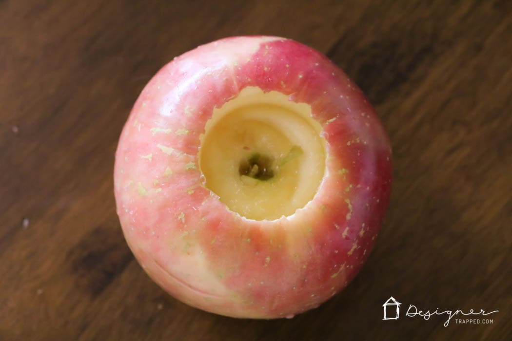 part of fresh apple removed to hold tea light candle