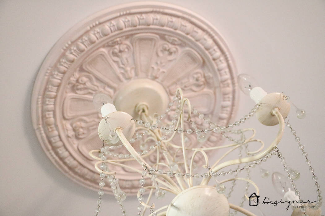 GENIUS! Deal with that unsightly ring left by flush mount light fixtures by customizing your own DIY ceiling medallion. Full tutorial from Designer Trapped in a Lawyer's Body.