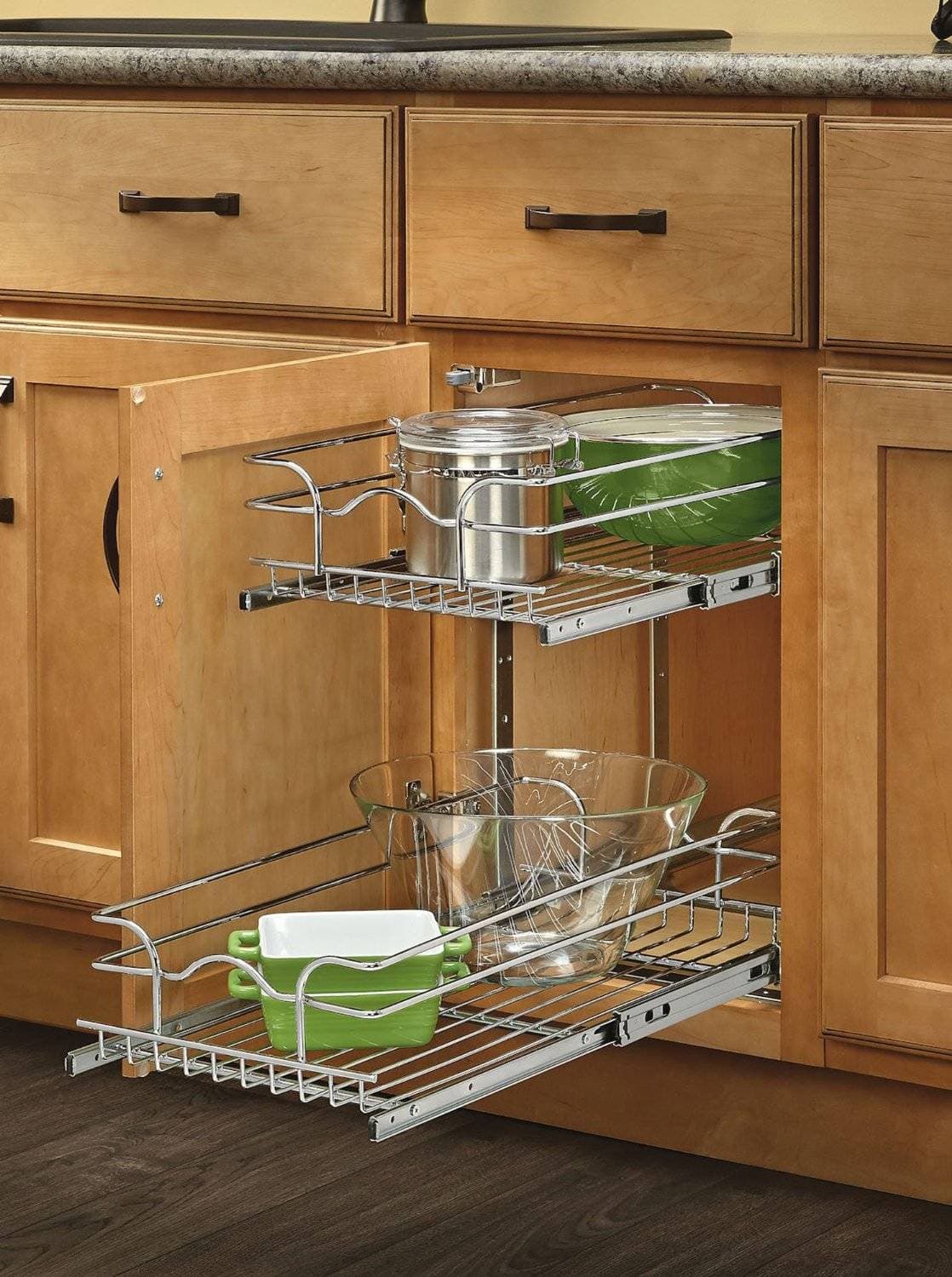 A cookie sheet and cutting board organizer holding various cutting boards and muffin tins against a white background.