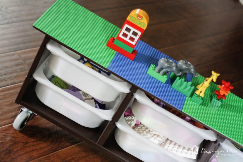 Awesome Ikea Hack! Make your own DIY lego table with this simple Ikea Hack. Perfect lego storage for your kids! Full tutorial from Designer Trapped in a Lawyer's Body.