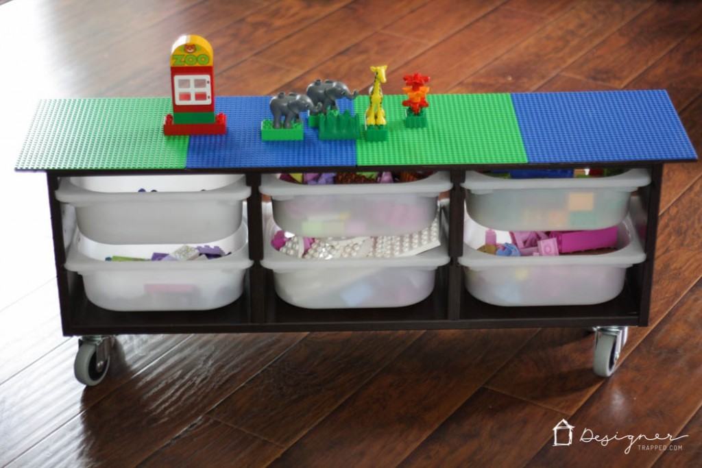 Awesome Ikea Hack! Make your own DIY lego table with this simple Ikea Hack. Perfect lego storage for your kids! Full tutorial from Designer Trapped in a Lawyer's Body.