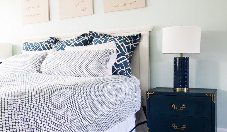 Love this navy and white master bedroom! The mixture of patterns is gorgeous!