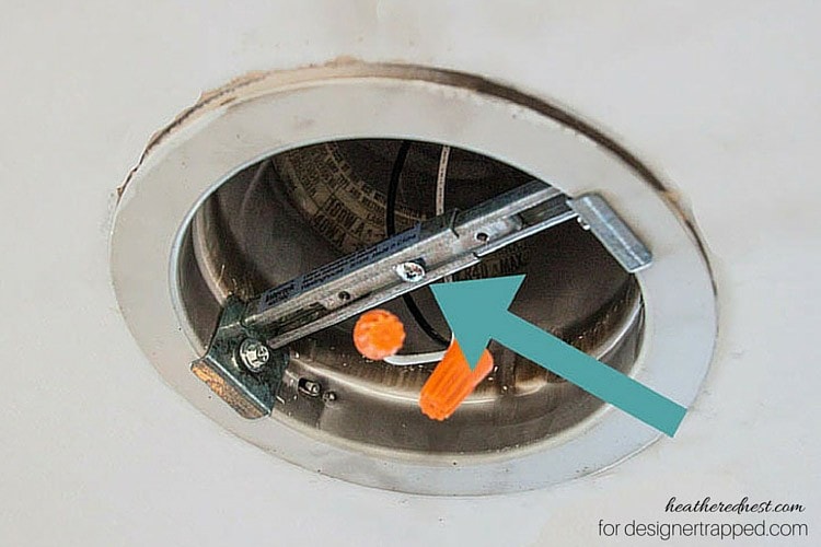 This is AWESOME! You can easily convert a recessed light to a pendant light with this tutorial by The Heathered Nest for designertrapped.com! 