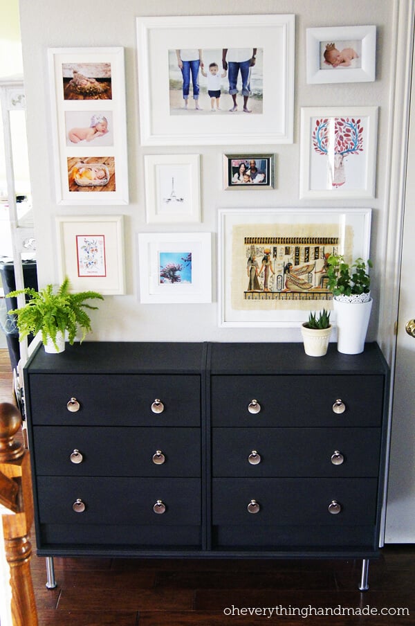 Two Rast dressers from IKEA have been painted black and metallic hardware, while framed photos adorn the wall above. The text reads "oheverythinghandmade.com." You can upgrade your furniture with these DIY IKEA hacks. 