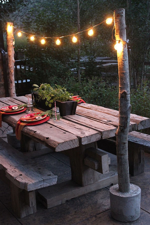 Fairy lights + utilitarian concrete + wood makes for beautiful DIY outdoor projects!
