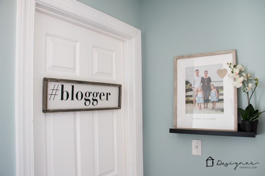 Create a hallway with PERSONALITY on a budget with DIY photo canvases and inexpensive photo ledges, coupled with some personalized art pieces. Love this!