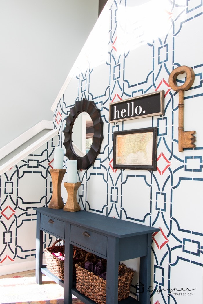 Love the look of wallpaper, but don't want to commit? Learn how to stencil for a BIG impact! Love the stencil this blogger used.