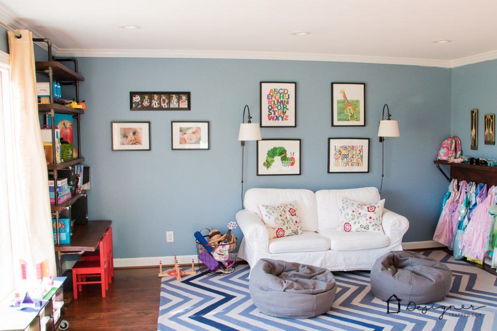 A kids' playroom doesn't have to be overly cutesy. There are tons of playroom decor options that kids and adults will both love. This room is a great example!