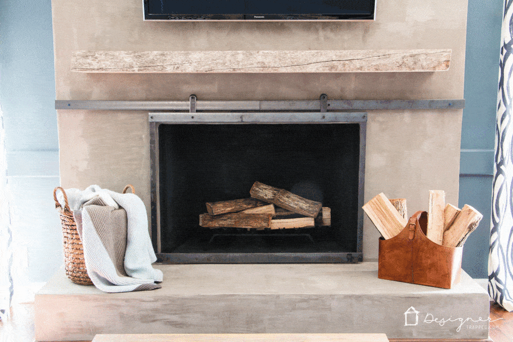 OMG, this fireplace makeover is amazing and was done on such a small budget!