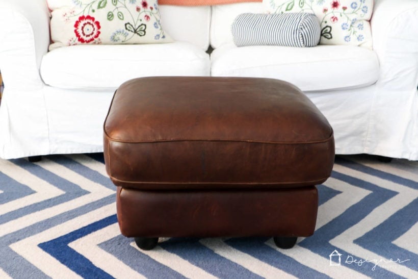 restored leather ottoman