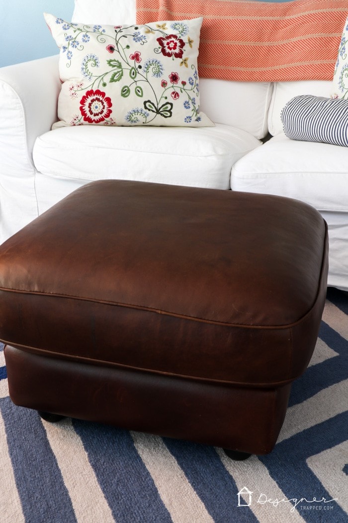 restored leather ottoman