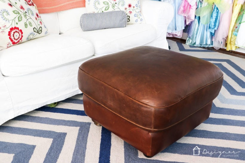 restored leather ottoman