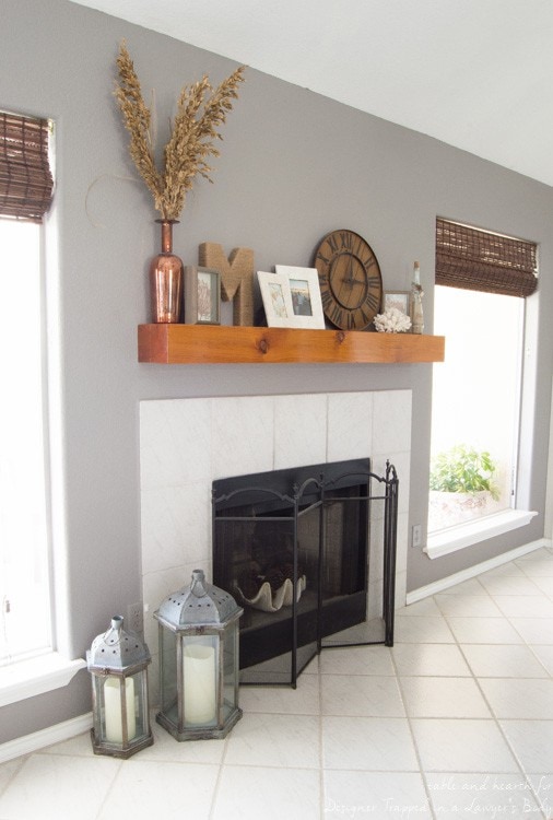 Wow! Check out this DIY fireplace mantel update made from simple molding. Love the driftwood finish! 