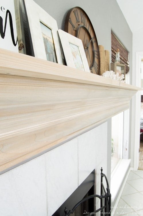 Wow! Check out this DIY fireplace mantel update made from simple molding. Love the driftwood finish! 