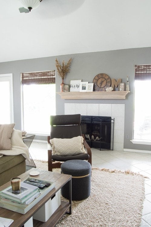 Wow! Check out this DIY fireplace mantel update made from simple molding. Love the driftwood finish! 