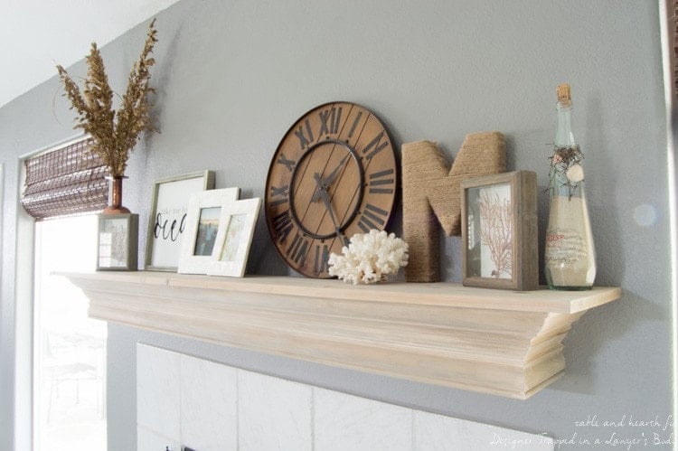 Wow! Check out this DIY fireplace mantel update made from simple molding. Love the driftwood finish! 