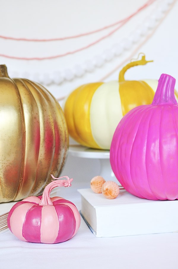 brightly colored faux pumpkins