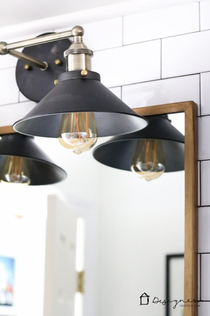 WOW, WOW, WOW! This DIY bathroom remodel is by far one of the best I have seen, and they REALLY did all the work themselves! I love the floor to ceiling subway tile, the black slate tile floor and the penny tile accents. And that floating vanity is amazing.