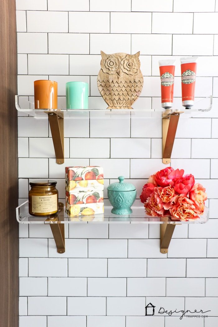 WOW, WOW, WOW! This DIY bathroom remodel is by far one of the best I have seen, and they REALLY did all the work themselves! I love the floor to ceiling subway tile, the black slate tile floor and the penny tile accents. And that floating vanity is amazing. 