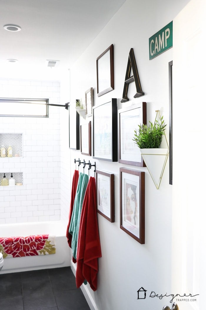 WOW, WOW, WOW! This DIY bathroom remodel is by far one of the best I have seen, and they REALLY did all the work themselves! I love the floor to ceiling subway tile, the black slate tile floor and the penny tile accents. And that floating vanity is amazing.