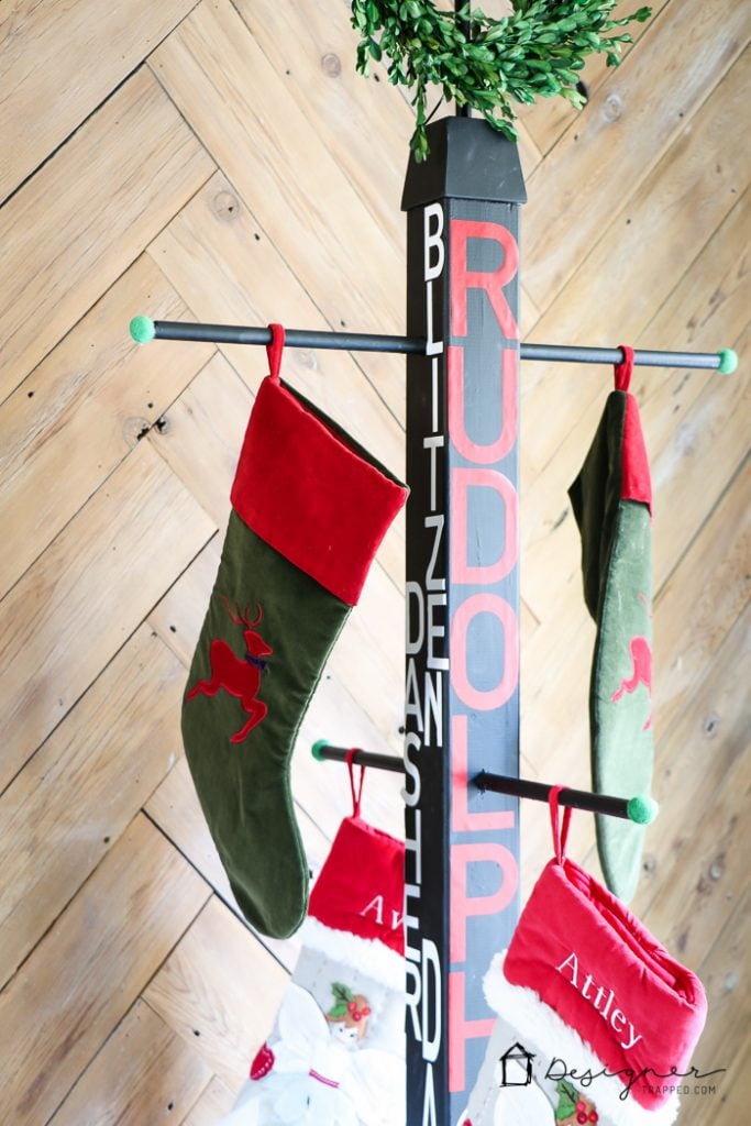 No mantel? No problem. You can hang Christmas stockings without a mantel. This DIY stocking holder stand is the perfect solution and this full tutorial makes it look so easy. #DIYworkshop #sponsored